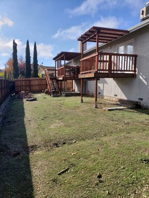 Vaughn Backyard - From the BEFORE pictures you can see that there was little space to relax and enjoy this backyard. We installed a 18 inch colored concrete retaining wall to match pavers, lawn with irrigation, and paver patio. Leveling and grading property made it great to walk on and enjoy our outdoor living to the fullest. Craftsmanship Roots and Culture. RTL Vaughn Backyard - From the BEFORE pictures you can see that there was little space to relax and enjoy this backyard. We installed a 18 inch colored concrete retaining wall to match pavers, lawn with irrigation, and paver patio. Leveling and grading property made it great to walk on and enjoy our outdoor living to the fullest. Craftsmanship Roots and Culture. RTL