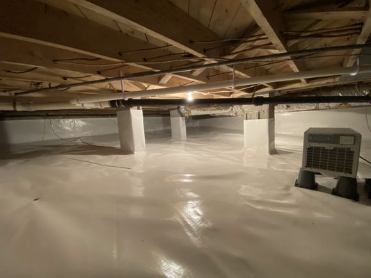 Crawlspace Encapsulation - Druid Hills - Another completed crawlspace encapsulation by APS Waterproofing in Druid Hills.
-- ENCAPSULATION BENEFITS --
- It protects your home from mold/mildew - Mold thrives in high humidity environments. By encapsulating the crawlspace, sealing the vents, and installing our commercial-grade dehumidifier, we can control the humidity and remove excess moisture from the air to discourage mold growth.
- Improves Indoor Air Quality - Cleaner air in the crawlspace will lead to cleaner air throughout the home. As dirt-floor crawlspaces are one of the largest contributors to musty odors, the encapsulation will help mitigate/eliminate these odors.
- Reduce Energy Costs - The Advanced Energy Nonprofit Consulting Firm has found that encapsulating a crawlspace can save up to 20% on your energy bills.
- Keeps Pests Out - Bugs and pests prefer dark and damp places. By encapsulating the crawlspace and sealing all the exterior vents, cracks, and holes, not only is it harder for pests to get inside the home, but it also creates an environment that is inhospitable to them.
- Utilize The Area For Storage - As the crawlspace is no longer damp and humid, you can safely store belongings in the crawlspace.
- Moisture Control - By utilizing the dehumidifier, we are able to control and maintain the ideal relative humidity throughout the crawlspace. Crawlspace Encapsulation - Druid Hills - Another completed crawlspace encapsulation by APS Waterproofing in Druid Hills.
-- ENCAPSULATION BENEFITS --
- It protects your home from mold/mildew - Mold thrives in high humidity environments. By encapsulating the crawlspace, sealing the vents, and installing our commercial-grade dehumidifier, we can control the humidity and remove excess moisture from the air to discourage mold growth.
- Improves Indoor Air Quality - Cleaner air in the crawlspace will lead to cleaner air throughout the home. As dirt-floor crawlspaces are one of the largest contributors to musty odors, the encapsulation will help mitigate/eliminate these odors.
- Reduce Energy Costs - The Advanced Energy Nonprofit Consulting Firm has found that encapsulating a crawlspace can save up to 20% on your energy bills.
- Keeps Pests Out - Bugs and pests prefer dark and damp places. By encapsulating the crawlspace and sealing all the exterior vents, cracks, and holes, not only is it harder for pests to get inside the home, but it also creates an environment that is inhospitable to them.
- Utilize The Area For Storage - As the crawlspace is no longer damp and humid, you can safely store belongings in the crawlspace.
- Moisture Control - By utilizing the dehumidifier, we are able to control and maintain the ideal relative humidity throughout the crawlspace.