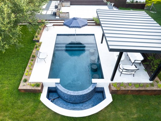 Windmill - It’s the details that turn a beautiful pool into a truly custom backyard.
This project was all about clean lines and thoughtful craftsmanship. From the custom-fabricated porcelain coping to the fully tiled weir wall and catch basin, every element was carefully designed to create a timeless, modern look.
The in-water barstools make the perfect place to gather with friends, while the custom pergola provides a comfortable retreat from the Texas sun. Every feature serves a purpose—and together they create a backyard built to be enjoyed for years to come.
📍Dripping Springs, Tx
#LuxuryPool #AustinPools #CustomPool #OutdoorLiving #ModernBackyard Windmill - It’s the details that turn a beautiful pool into a truly custom backyard.
This project was all about clean lines and thoughtful craftsmanship. From the custom-fabricated porcelain coping to the fully tiled weir wall and catch basin, every element was carefully designed to create a timeless, modern look.
The in-water barstools make the perfect place to gather with friends, while the custom pergola provides a comfortable retreat from the Texas sun. Every feature serves a purpose—and together they create a backyard built to be enjoyed for years to come.
📍Dripping Springs, Tx
#LuxuryPool #AustinPools #CustomPool #OutdoorLiving #ModernBackyard