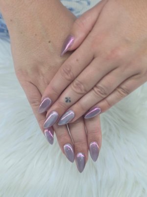 Beautiful full set acrylic chrome effect - Full Set Chrome Nails ✨
Shiny, bold, and elegant! This pink-purple chrome finish with a sharp stiletto shape makes a statement while staying classy. Perfect for parties, date nights, or anytime you want to feel confident and glamorous.

👉 A must-try look if you love eye-catching nails that stand out!