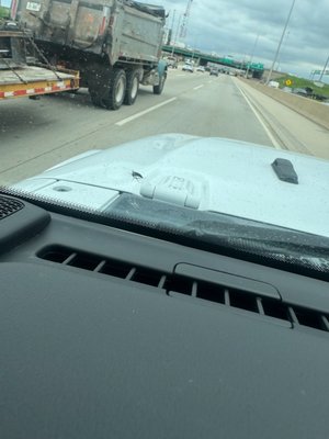 Arlington Heights Rock Chip repair - Our client was just riding down the highway and then boom a huge rock hit the windshield and without warning she had a chip. She did not hesitate to call reaching out to us before her drive was even over. We were able to get to her location a few days later and get this chip looking great quickly so the chip didn't spread.