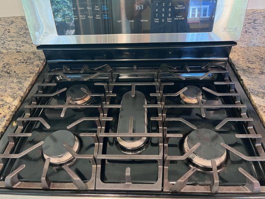 Kitchen Deep Clean – Stove Refresh - This kitchen had a well-used stove that needed a serious reset. Grease, food debris, and build-up had collected around the burners and on the stovetop. Our team carefully cleaned and polished the surfaces using eco-friendly, non-toxic products that cut through grime without harsh chemicals.

The result? A spotless stovetop that looks nearly new again—ready for safe cooking and a cleaner kitchen environment.

If your appliances need more than a quick wipe-down, our deep cleaning service restores shine and makes ongoing maintenance easier.