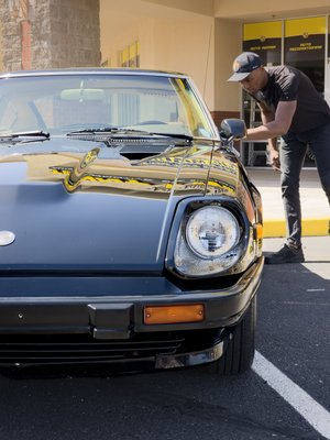 1982 Datsun 280zx Detail, Paint Correction, Paint Touch-up, Wheel Repair - This 1982 Datsun 280zx came in with it's paint in dire need of attention. The owner wanted to car to look factory fresh without compromising the original paint. the vehicle is a gloss black vehicle with no metallic flake. This would make it necessary to perform a 3-stage paint correction to ensure there are no scratches, swirl marks, or marring left in the paint. We started off deep cleaning the vehicle with a handwash and dry. The Datsun's paint can be assessed more accurately when the vehicle is rid of any grease or road-grime. The paint thickness is measured to determine how much clearcoat there is left. This is an important step to make sure the clearcoat is not burned through during the paint correction process. All painted portions of the vehicle is clay bared to remove contamination that has imbedded in the paint over the years. Once properly clay bared the paint should be left smooth. Now the paint correction can begin. Three different compounds are used to remove all swirls, scratches, and haziness left by the previous compounds (marring). touch-up paint is applied and blended to make chips in the paint less noticeable. The customer also requested the wheels to be fixed as best as possible. The wheels were removed from the vehicle and hand-polished. The wheels were then masked off and painted to match the factory color. This completed the work, leaving the car in a "better than factory" look! 1982 Datsun 280zx Detail, Paint Correction, Paint Touch-up, Wheel Repair - This 1982 Datsun 280zx came in with it's paint in dire need of attention. The owner wanted to car to look factory fresh without compromising the original paint. the vehicle is a gloss black vehicle with no metallic flake. This would make it necessary to perform a 3-stage paint correction to ensure there are no scratches, swirl marks, or marring left in the paint. We started off deep cleaning the vehicle with a handwash and dry. The Datsun's paint can be assessed more accurately when the vehicle is rid of any grease or road-grime. The paint thickness is measured to determine how much clearcoat there is left. This is an important step to make sure the clearcoat is not burned through during the paint correction process. All painted portions of the vehicle is clay bared to remove contamination that has imbedded in the paint over the years. Once properly clay bared the paint should be left smooth. Now the paint correction can begin. Three different compounds are used to remove all swirls, scratches, and haziness left by the previous compounds (marring). touch-up paint is applied and blended to make chips in the paint less noticeable. The customer also requested the wheels to be fixed as best as possible. The wheels were removed from the vehicle and hand-polished. The wheels were then masked off and painted to match the factory color. This completed the work, leaving the car in a "better than factory" look!