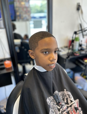 Kid's Cuts - Cutz By Cleve takes pride in offering women's haircuts at their barbershop as well. Their skilled barbers are trained to cater to diverse styling preferences, ensuring that women can also enjoy the same high-quality, personalized service that their male clients receive. Whether it's a classic cut or a trendy style, Cutz By Cleve welcomes women looking for a professional and stylish haircut experience in their cozy barbershop setting. Kid's Cuts - Cutz By Cleve takes pride in offering women's haircuts at their barbershop as well. Their skilled barbers are trained to cater to diverse styling preferences, ensuring that women can also enjoy the same high-quality, personalized service that their male clients receive. Whether it's a classic cut or a trendy style, Cutz By Cleve welcomes women looking for a professional and stylish haircut experience in their cozy barbershop setting.