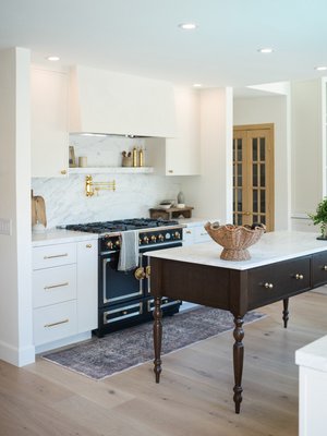 Newbury Kitchen Remodel - We provided the plumbing fixtures for this project, including the pot-filler, kitchen faucet, hot/cold filter faucet, and bridge faucet. We also provided the cabinet hardware. Newbury Kitchen Remodel - We provided the plumbing fixtures for this project, including the pot-filler, kitchen faucet, hot/cold filter faucet, and bridge faucet. We also provided the cabinet hardware.