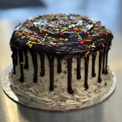 2 Layer Custom Cake - Sharing a cake creates moments of connections whether it's a party, celebration or family gathering. We absolutely love designing and baking custom cakes for our customers for all of their birthdays, weddings, anniversaries and more. All of our cakes come gluten free, dairy free and vegan, created from scratch in our dedicated gluten free & dairy free bakery. We look forward to lifting spirits, bringing comfort and happiness to your next celebration.