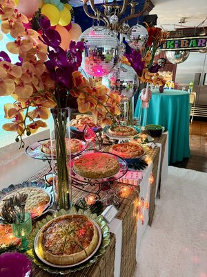 IBIZA STYLE BABY SHOWER BRUNCH - Madison and Andy Highmore decided an Ibiza Style End of Season Baby Shower theme was a fun and appropriate way to realize their other life was over and ready to bring their baby boy - Hudson Neil, into their new world. They wanted colorful tropics, disco balls and the best of Ibiza soundtrack to create a cool energized vibe to entertain their 40 invited guests.
We transform the living room into a poolside dream with colorful beach murals, white shag area rugs, cocktail tables, exotic tropical flower displays & pink flamingo string lights.
They wanted to provide a brunch style feast with assorted quiche, mini sandwiches and delicious mochi donuts. It was so much fun!
Truly a grand success!
Contact us @
www.fallierfood.com
201-590-8971 Office
201-320-4837 Cell IBIZA STYLE BABY SHOWER BRUNCH - Madison and Andy Highmore decided an Ibiza Style End of Season Baby Shower theme was a fun and appropriate way to realize their other life was over and ready to bring their baby boy - Hudson Neil, into their new world. They wanted colorful tropics, disco balls and the best of Ibiza soundtrack to create a cool energized vibe to entertain their 40 invited guests.
We transform the living room into a poolside dream with colorful beach murals, white shag area rugs, cocktail tables, exotic tropical flower displays & pink flamingo string lights.
They wanted to provide a brunch style feast with assorted quiche, mini sandwiches and delicious mochi donuts. It was so much fun!
Truly a grand success!
Contact us @
www.fallierfood.com
201-590-8971 Office
201-320-4837 Cell