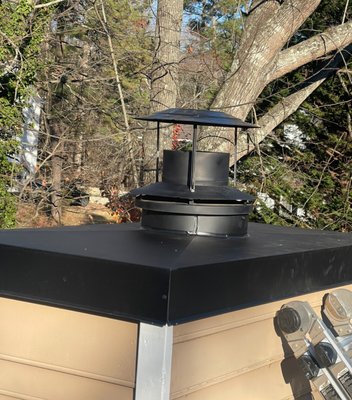 New Chimney Pan - This chimney's pan was rusted and was leaking. Academy Roofing installed a new custom metal chimney pan with rust resistant black paint.