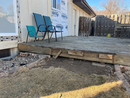 Deck Demolition and Removal with slight grading and rock replacement. - Deck Demolition and Removal with slight grading and rock replacement. Deck Demolition and Removal with slight grading and rock replacement. - Deck Demolition and Removal with slight grading and rock replacement.