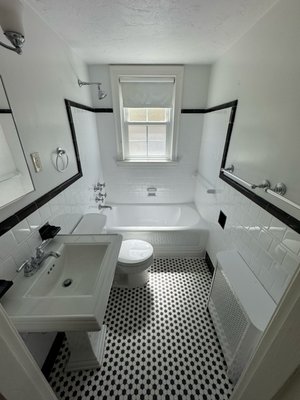 A full bathroom refresh was completed for a home in Milton, MA - A full bathroom refresh was completed for a home in Milton, MA.

We refinished the tub, reglazed the wall tiles, and re-grouted the entire area for a clean, polished finish. The black tile trim pops beautifully now against the glossy white walls, and the space feels brighter and more welcoming. As always, we protected the space carefully and left it spotless once the work was complete.

Fall in love with your tub again.
Call First Class Glazing today at 617-849-0513.
www.firstclassglazing.com