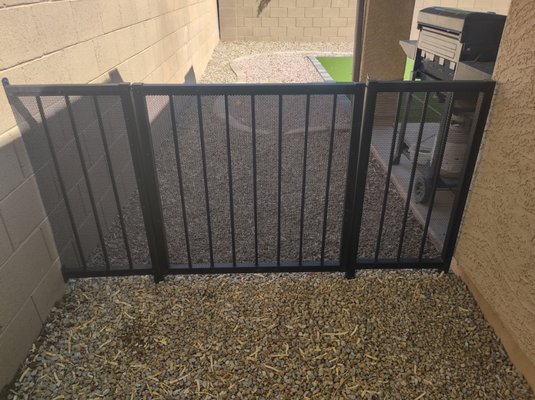 Dog enclosure. - Customer installed a new doggie door and wanted an enclosure made to keep dogs out of construction zone as she was getting ready to have a swimming pool installed.