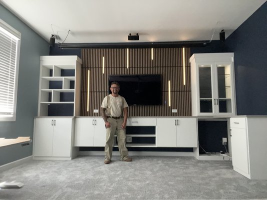 Entertainment Wall - Added new lighting and outlets to room painted and new carpet