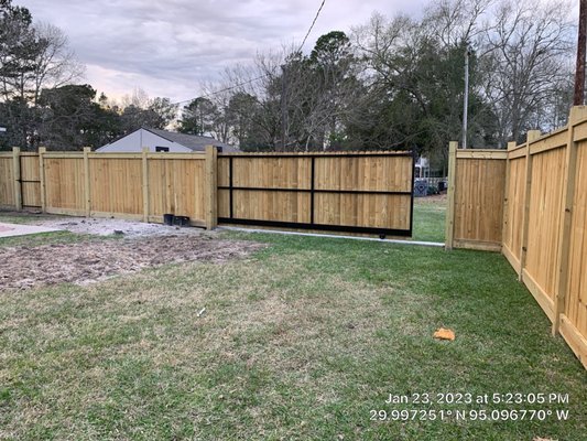 Fence Install - Metal Frame Slide Gate on Vtrack. with Pine pickets Fence Install - Metal Frame Slide Gate on Vtrack. with Pine pickets