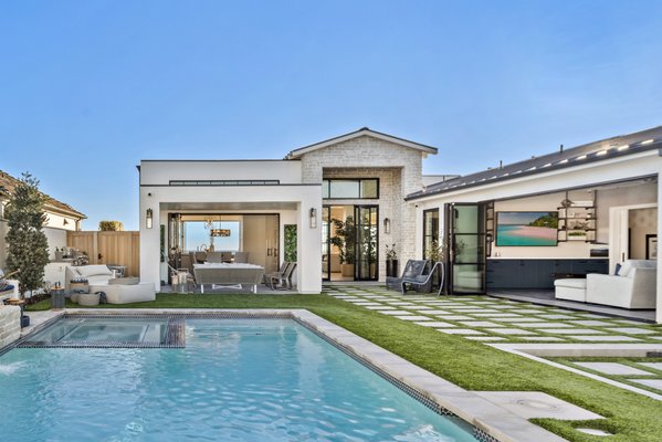 Bartusick Residence -location Corona Del Mar - New single-story home located in Corona Del Mar. The new floor plan design included an open floor plan for the entry, family room, dining room and kitchen area. At the rear of the home to maximize the ocean view in a 10-foot high by 35' feet wide stacking sliding glass door system was designed for the full width of the family and morning room areas. Also, stacking glass door systems were included for the rear master bedroom, front dining room and bonus rooms. Total living area is 3,500 sq. ft. Bartusick Residence -location Corona Del Mar - New single-story home located in Corona Del Mar. The new floor plan design included an open floor plan for the entry, family room, dining room and kitchen area. At the rear of the home to maximize the ocean view in a 10-foot high by 35' feet wide stacking sliding glass door system was designed for the full width of the family and morning room areas. Also, stacking glass door systems were included for the rear master bedroom, front dining room and bonus rooms. Total living area is 3,500 sq. ft.