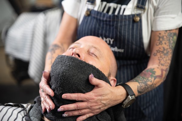 Hot Towel Shaves at ManBasics Speakeasy Barbershop - ManBasics Speakeasy Barbershop is a real BARBER shop. We provide hot towel shaves and real straight razor shaving services. Oh, and every service comes with a complimentary cocktail. We recommend our signature Whiskey Old Fashioned. Hot Towel Shaves at ManBasics Speakeasy Barbershop - ManBasics Speakeasy Barbershop is a real BARBER shop. We provide hot towel shaves and real straight razor shaving services. Oh, and every service comes with a complimentary cocktail. We recommend our signature Whiskey Old Fashioned.