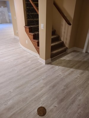 Tile and carpet removal and vinyl plank installation with trim - Wow this was a basement that we removed tile and carpet and installed luxury vinyl plank with trim
