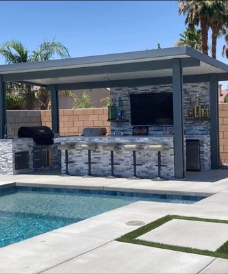 Outdoor Living Transformations – Pools, Fireplaces, BBQs, Pavers & Concrete - This project showcases a full range of outdoor remodeling services completed by Eagle Custom Construction.

Water Feature & Pool Restoration: We transformed a worn-out rock stream and pool feature into a fresh, modern look with new plaster, sealing, and water circulation improvements. The before-and-after shows the dramatic change from neglected to beautiful and functional.

Outdoor Fireplace Upgrade: We updated a plain stucco fireplace by adding custom tile work, giving it a vibrant, high-end look. The transformation brought new life and character to the outdoor living space.

Custom BBQ & Patio Kitchen: Designed and built a modern BBQ island with bar seating, storage, sink, grill, fridge, and TV wall — all finished in sleek stacked stone with a shaded aluminum patio cover. Perfect for entertaining and year-round outdoor living.

Pavers & Concrete Work: From driveways to walkways and patios, we installed durable concrete and elegant paver designs. Our work combines functionality with beauty, enhancing curb appeal and adding long-lasting value to every property.


Our team is fully licensed, bonded, and insured. Every project is completed with attention to detail, quality materials, and a commitment to customer satisfaction.

📞 Call Eagle Custom Construction today to bring new value and beauty to your outdoor space! 442-599-2860