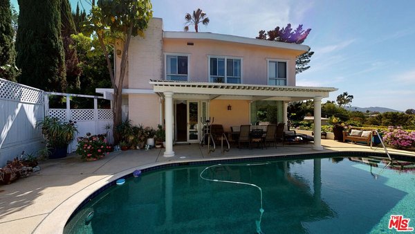 I Sold the home 250,000 above asking price - Location, Views, Privacy... This home offers it all. Conveniently located short distance from Beverly Hills, Bell Air, Santa Monica Pier and anywhere in the Valley with views all the way to the other side of the San Fernando Valley mountain picks. Formal entrance with marble floors throughout living room and kitchen takes you to oversized kitchen with marble top island for family gatherings with amazing views to the valley. Downstairs bedroom with it's full bathroom may be a perfect for an office or guest quarters. Grand staircase leading up to five bedrooms with two master suits and 3 balconies for a quite night of sunset watching. Plenty of flat back yard space to host parties by the pool and and barbeque area. Pool was recently re-plastered and all pool equipment was replace last year. I Sold the home 250,000 above asking price - Location, Views, Privacy... This home offers it all. Conveniently located short distance from Beverly Hills, Bell Air, Santa Monica Pier and anywhere in the Valley with views all the way to the other side of the San Fernando Valley mountain picks. Formal entrance with marble floors throughout living room and kitchen takes you to oversized kitchen with marble top island for family gatherings with amazing views to the valley. Downstairs bedroom with it's full bathroom may be a perfect for an office or guest quarters. Grand staircase leading up to five bedrooms with two master suits and 3 balconies for a quite night of sunset watching. Plenty of flat back yard space to host parties by the pool and and barbeque area. Pool was recently re-plastered and all pool equipment was replace last year.