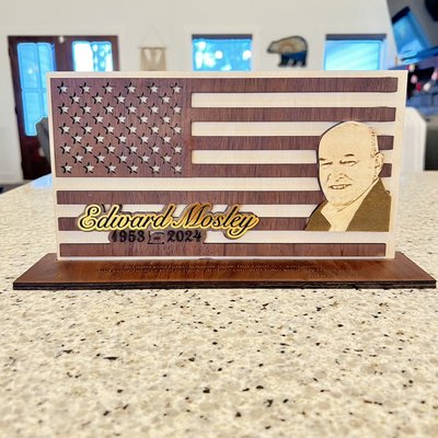 Custom made Walnut & basswood Veteran Memorial placard - We were blessed to be a part of this special project for an Army Veteran. Image processed to show depth of shadows. The Walnut looks deep and beautiful, pictures don’t show the detail. Bible verse engraved on base for family to cherish for generations. Custom made Walnut & basswood Veteran Memorial placard - We were blessed to be a part of this special project for an Army Veteran. Image processed to show depth of shadows. The Walnut looks deep and beautiful, pictures don’t show the detail. Bible verse engraved on base for family to cherish for generations.