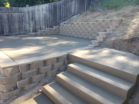 Raised concrete deck Spring 25 - We created a raised deck and staircase
