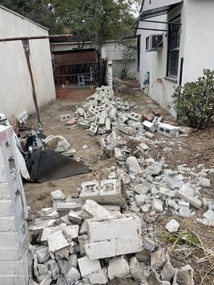 Demo Of Block Wall - This project was to claim property line in between two neighbors. My client asked I break down original brick wall and set up temporary chain link fence to claim back original property line. Made sure to work with client as well as neighbor to make all parties satisfied. Demo Of Block Wall - This project was to claim property line in between two neighbors. My client asked I break down original brick wall and set up temporary chain link fence to claim back original property line. Made sure to work with client as well as neighbor to make all parties satisfied.