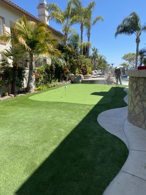 Putting Green in Huntington Beach - This backyard is now ready for summertime. The homeowner will be placing a trampoline in the larger green area and now has much more room for putting with the family and friends.