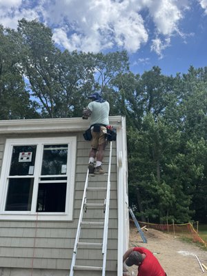 Seamless Gutter Installation Dedham - New construction 5" white, k-style, aluminum, seamless gutters and downspouts.
