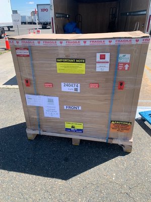 Custom Bar Pickup and Delivery - This 600 pound custom bar was picked up from the shipper warehouse, transported to the customers home, carried down several flights of stairs and, place in the customers lounge area.