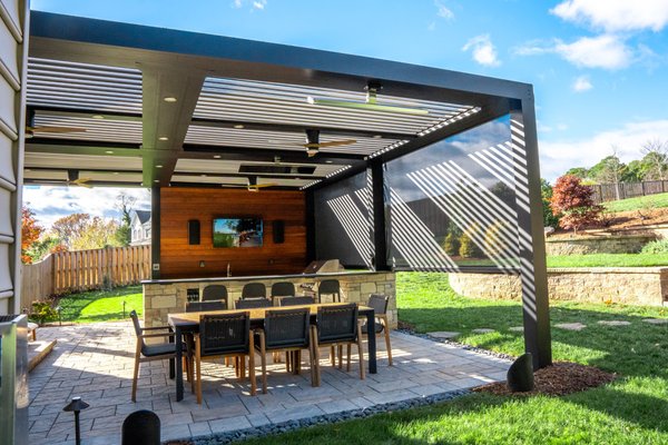 Struxure® MidAtlantic Residential Pergola - These homeowners were looking for an outdoor kitchen and dining area. With Struxure® pergola X they received everything they expected and more. Motorized Louvered systems with wind and rain sensors. Along with lighting, fans, heaters, and screens for year-long use. Struxure® MidAtlantic Residential Pergola - These homeowners were looking for an outdoor kitchen and dining area. With Struxure® pergola X they received everything they expected and more. Motorized Louvered systems with wind and rain sensors. Along with lighting, fans, heaters, and screens for year-long use.