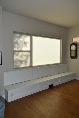 Built-In Kitchen Bench - This project was done for a customer in need of more seat space in their "breakfast nook". They wanted storage as well as a durable seat for larger family members. We built this bench out of durable 3/4" maple plywood, self-supporting seat lid struts, quality piano hinges - all with an emphasis on the client's seat depth/height requirements.
Electrical wiring was pulled prior to install to allow us to fish those wires through our thoughtfully designed bench sections and install outlets on their faces. The central bench section has a cavity in the bottom portion which has been fitted with a HVAC vent (not shown in photos). Built-In Kitchen Bench - This project was done for a customer in need of more seat space in their "breakfast nook". They wanted storage as well as a durable seat for larger family members. We built this bench out of durable 3/4" maple plywood, self-supporting seat lid struts, quality piano hinges - all with an emphasis on the client's seat depth/height requirements.
Electrical wiring was pulled prior to install to allow us to fish those wires through our thoughtfully designed bench sections and install outlets on their faces. The central bench section has a cavity in the bottom portion which has been fitted with a HVAC vent (not shown in photos).