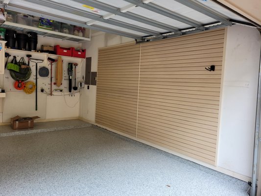 Epoxy floor and Slatwall - Simple solution for limited storage for this client. The slatwall and epoxy floor gave this garage a much better place to park his BMW, don't you think? Epoxy floor and Slatwall - Simple solution for limited storage for this client. The slatwall and epoxy floor gave this garage a much better place to park his BMW, don't you think?