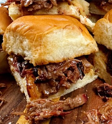 Catering Options - This guide explains Typical serving sizes for main proteins and sides when ordering BBQ trays.
Items are delivered in aluminum pans, hot and ready to consume immediately.

Half size pans serve 10-15 - Full size pans feed 22-30
Typical Serving Sizes for BBQ Proteins
Ribs- 2-3 ribs per person
Brisket- 1/3 pound per person
 Pulled Pork- 1/3 pound per person
 Pulled Chicken- 1/3 pound per person
 Sausage- 1-2 links per person
Wings- 2-4 wings per person
For sides, use the half pan/full pan guide above
Adjust portions according to the protein mix, menu composition, and your guests’ appetites.
- If serving multiple types, you can reduce the amount of each protein slightly.

If you have any questions or need further assistance, feel to call ,email or text!
