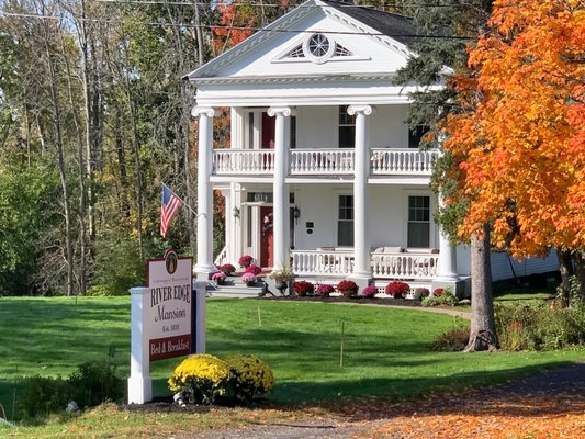 River Edge Mansion-Schroeppel History - This landmark structure was built in 1818 by George Casper Schroeppel. The stately Greek Revival Mansion is listed in the US National Register of Historic Places. 

This nearly 200-year-old structure has five marble and stone fireplaces. Pocket doors and a tin ceiling remain as do exquisite hand-carved moldings and cornices. Three beautifully appointed guest suites furnished with period fine antiques and oriental rugs will warm the hearts of the most discerning guest. This gracious bed & breakfast allows you to escape from the ordinary.

Tastefully decorated rooms create an atmosphere of elegance and refinement yet allow you to completely relax and feel right at home. Indulge in a whirlpool bath, read by a marble fireplace or dream under the canopy of an antique bedstead. Spacious surroundings inside and out give you an opportunity for complete privacy or gracious sharing. A pathway leads you directly to the Oneida River where you will find docking facilities with water and electricity hookup for boating, fishing, and swimming. If you are traveling on the canal, dock your boat and stay a night or two!

Combine all of this with fabulous gourmet breakfasts and you may never want to leave!