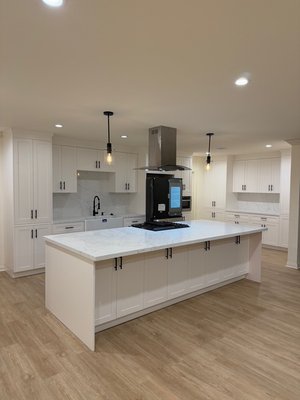 Kitchen remodel Lazard St. - The kitchen was remodeled with a modern touch, featuring an open-concept design that creates a warm and welcoming space for family living. Kitchen remodel Lazard St. - The kitchen was remodeled with a modern touch, featuring an open-concept design that creates a warm and welcoming space for family living.