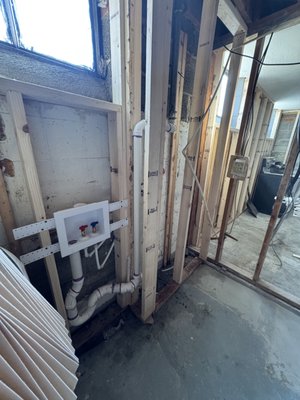 Washer Drain Replacement - Replaced old washing machine drain and drum trap with a in wall washing machine drain box.