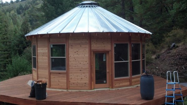 Exterior finishing by Rolling Along Painting - My client had put a yurt on his property and invited us to finish.  Sealed with Armstrongs Natural oil finish.  Exterior painting and finish done by Rolling Along Painting