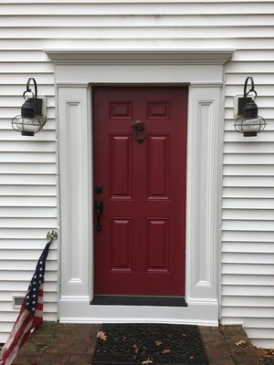 Front entrance renovation. - While this front door looked to be in pretty good shape from the first photo, there is usually more than meets the eye when it comes to older homes. The ceiling just inside the front door showed water damage. It was determined that water was able to run behind the front door surround, damaging the areas underneath.
Our carpenters removed the entire surround. Once all the rotted areas were removed, the carpenters replaced the surround with Azek composite. Azek is durable and water resistant.
The homeowners selected a similar, traditional front door, except the new front door did not have any windows. The door came primed in white. Our painters painted the door a nearly identical red as they had before.
Our carpenters also took care of replacing the rotted window trim while on site. We also power washed the entire home to rid the house of mildew.
Now, this front entrance is ready to welcome guests. Front entrance renovation. - While this front door looked to be in pretty good shape from the first photo, there is usually more than meets the eye when it comes to older homes. The ceiling just inside the front door showed water damage. It was determined that water was able to run behind the front door surround, damaging the areas underneath.
Our carpenters removed the entire surround. Once all the rotted areas were removed, the carpenters replaced the surround with Azek composite. Azek is durable and water resistant.
The homeowners selected a similar, traditional front door, except the new front door did not have any windows. The door came primed in white. Our painters painted the door a nearly identical red as they had before.
Our carpenters also took care of replacing the rotted window trim while on site. We also power washed the entire home to rid the house of mildew.
Now, this front entrance is ready to welcome guests.