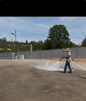 Treating drive isles with Dust inhibitor - We laid down dust inhibitor to our drive isles in order to keep your Boat and RV looking clean and dust dust free. Rhino Snot is used by the US military to bind the fine grains in road base to create a dust free environment. Its environmentally friendly as well.
