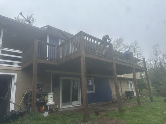 Complete Exterior Renovation-Deck, Siding, & Gutters - We transformed this home's exterior with a full deck renovation, modern siding replacement, and seamless new gutters. The result is a fresh, polished look that boost curb appeal, adds protection, and creates a welcoming outdoor space.
Before: The deck was unsafe with worn boards, the siding was weathered and outdated, and the gutters were no longer draining properly.
After: The homeowners now enjoy a brand-new, safe deck, fresh siding that boosts curb appeal, and seamless gutters designed to protect the home for years to come. Complete Exterior Renovation-Deck, Siding, & Gutters - We transformed this home's exterior with a full deck renovation, modern siding replacement, and seamless new gutters. The result is a fresh, polished look that boost curb appeal, adds protection, and creates a welcoming outdoor space.
Before: The deck was unsafe with worn boards, the siding was weathered and outdated, and the gutters were no longer draining properly.
After: The homeowners now enjoy a brand-new, safe deck, fresh siding that boosts curb appeal, and seamless gutters designed to protect the home for years to come.