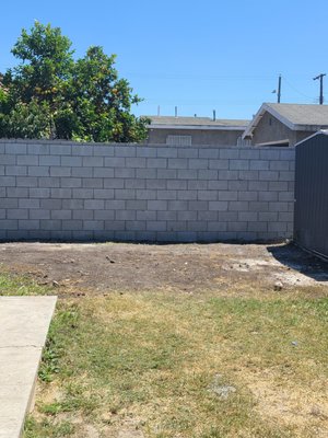 CMU Block Property Line Wall - Client needed more privacy/security and no longer wished to have a view of their neighbor's cluttered yard. CMU Block Property Line Wall - Client needed more privacy/security and no longer wished to have a view of their neighbor's cluttered yard.