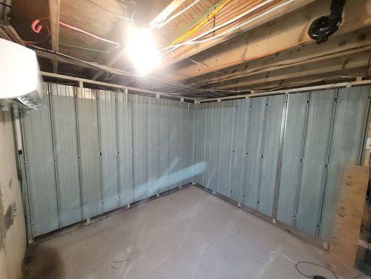 Basement reno at The Blue Muscle Cafe - Our client had some extra sheet metal from a roof after a tear down and needed a room for their air b&b laundry area so we designed a room for them using some of their materials with an old patina look Basement reno at The Blue Muscle Cafe - Our client had some extra sheet metal from a roof after a tear down and needed a room for their air b&b laundry area so we designed a room for them using some of their materials with an old patina look