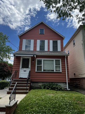 Exterior Painting in Clifton Nj - This exterior painting job done in Clifton Nj. Was left with a beautiful finish. We prepared the vinyl siding prior to painting by filling in some dents defects in it with some bondo to leave it with a smooth finish. Looks brand new! Exterior Painting in Clifton Nj - This exterior painting job done in Clifton Nj. Was left with a beautiful finish. We prepared the vinyl siding prior to painting by filling in some dents defects in it with some bondo to leave it with a smooth finish. Looks brand new!