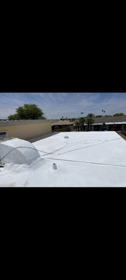 Roof Coating And Repair - Repair and coating with white elastomeric roof coating Roof Coating And Repair - Repair and coating with white elastomeric roof coating