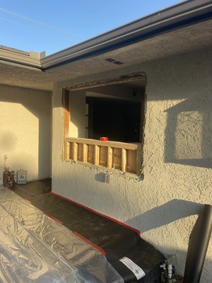 Stucco Repair Around window-Fresno - Stucco repair around window area. Damaged section was removed, new lath installed, and scratch and brown coats applied. Final texture was matched to blend seamlessly with existing wall.