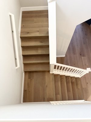 Hardwood Floor Installation - For this particular project, we began by removing the existing carpet and tiles and proceeded to install hardwood flooring throughout the entire house, including the staircase, using a glue-down method. Our team is available to assist you in selecting the perfect flooring for your residence, workplace or commercial property. Give us a call at 916-601-4969 for a free home estimate.