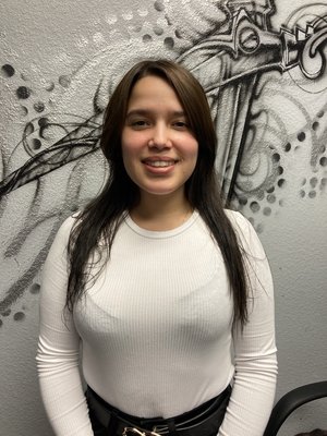 Short layers women’s haircut by Tyreema - This beauty was very unhappy with her flat tresses so we took off a few inches and gave her a new look! Book your haircut by Tyreema today!