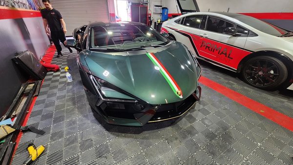 CUSTOM VEHICLE WRAPS - A car wrap is basically a huge vinyl decal that is applied over the painted panels or other surfaces of your car.
This coverage can be complete, over every single panel of your car, like a new paint job or it can cover a very specific area of your car to change the appearance of your spoiler or hood.
One of the biggest reasons people choose to wrap their vehicles is that wraps can be quickly removed. A technician can quickly peel off vinyl to reveal the original, undamaged paint underneath. For people who want to apply a unique design or graphics temporarily, wraps can change the appearance of the car with the option to easily change it back to the original appearance. CUSTOM VEHICLE WRAPS - A car wrap is basically a huge vinyl decal that is applied over the painted panels or other surfaces of your car.
This coverage can be complete, over every single panel of your car, like a new paint job or it can cover a very specific area of your car to change the appearance of your spoiler or hood.
One of the biggest reasons people choose to wrap their vehicles is that wraps can be quickly removed. A technician can quickly peel off vinyl to reveal the original, undamaged paint underneath. For people who want to apply a unique design or graphics temporarily, wraps can change the appearance of the car with the option to easily change it back to the original appearance.