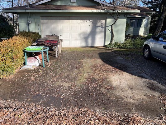 Customer Pathway - This customer was very happy with the services we provided. We blasted away 20 years of dirt and grime from their driveway and concrete path surrounding their home.