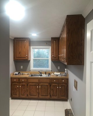 Cabinet Project #1 - These 2 cabinets were completed on a full renovation project. The contractor bring us in because we are great at cabinet painting. They started out wood, then we deglaze, apply oil based primer, and top coat with Sherwin Williams Emerald Urethane. Cabinet Project #1 - These 2 cabinets were completed on a full renovation project. The contractor bring us in because we are great at cabinet painting. They started out wood, then we deglaze, apply oil based primer, and top coat with Sherwin Williams Emerald Urethane.
