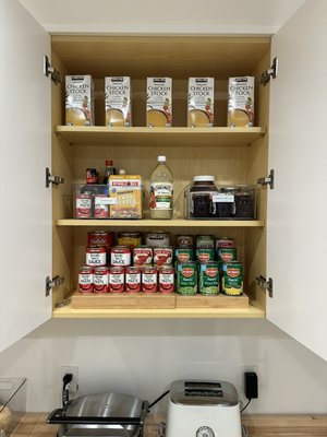 Pantry overhaul - This pantry was a converted bedroom and had ample storage. Yet, every time the client stepped foot inside she was so stressed out by the chaos and overflow of food items. After understanding her morning routine and cooking habits, I was able to create a system that was both functional and beautiful.